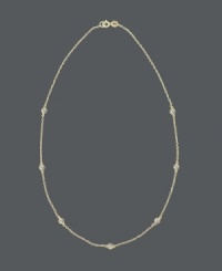 Cover every inch with sparkle. B. Brilliant's subtle station necklace features bezel-set cubic zirconias (3/4 ct. t.w.) strung from a delicate chain. Crafted in 18k gold over sterling silver. Approximate length: 18 inches. Cover every inch with sparkle. B. Brilliant's subtle station necklace features bezel-set cubic zirconias (3/4 ct. t.w.) strung from a delicate chain. Crafted in 18k gold over sterling silver. Approximate length: 18 inches.