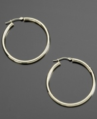 Gleaming appeal. These shining hoop earrings are crafted in 14k gold. Approximate diameter: 3/8 inch. Gleaming appeal. These shining hoop earrings are crafted in 14k gold. Approximate diameter: 3/8 inch.