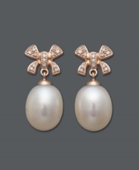 Polished and presentable. Add a touch of femininity to any look with these cultured freshwater pearl (10-11 mm) and diamond-encrusted (1/8 ct. t.w.) bow earrings. Crafted in 14k rose gold. Approximate drop: 1 inch. Polished and presentable. Add a touch of femininity to any look with these cultured freshwater pearl (10-11 mm) and diamond-encrusted (1/8 ct. t.w.) bow earrings. Crafted in 14k rose gold. Approximate drop: 1 inch.