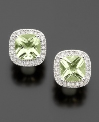 The serene color of cushion-cut green quartz (2-1/5 ct. t.w.) pairs perfectly with sparkling round-cut diamonds (1/4 ct. t.w.) in elegant 14k white gold. The serene color of cushion-cut green quartz (2-1/5 ct. t.w.) pairs perfectly with sparkling round-cut diamonds (1/4 ct. t.w.) in elegant 14k white gold.