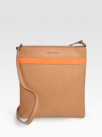 Sleek leather carryall with adjustable shoulder strap is perfect for an on-the-go lifestyle.Zip closureAdjustable strapFully linedLeather12W x 13H x 1DImported Sleek leather carryall with adjustable shoulder strap is perfect for an on-the-go lifestyle.Zip closureAdjustable strapFully linedLeather12W x 13H x 1DImported