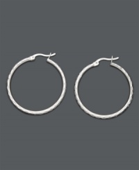 Superior Style. Giani Bernini's chic diamond-cut hoops are a must-have for every girl's collection. Crafted in polished sterling silver. Approximate diameter: 1-1/5 inches. Superior Style. Giani Bernini's chic diamond-cut hoops are a must-have for every girl's collection. Crafted in polished sterling silver. Approximate diameter: 1-1/5 inches.