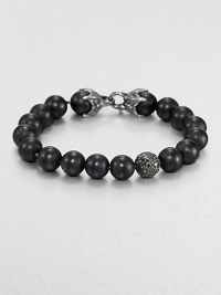 From the Spirited Bead Collection, this two-row beaded bracelet is handsomely crafted from 10mm black onyx beads, featuring a pave black diamond station and a sterling silver lobster clasp.Sterling silverBlack onyx/diamondAbout 9 longAbout 3 diam.Lobster claspImported From the Spirited Bead Collection, this two-row beaded bracelet is handsomely crafted from 10mm black onyx beads, featuring a pave black diamond station and a sterling silver lobster clasp.Sterling silverBlack onyx/diamondAbout 9 longAbout 3 diam.Lobster claspImported