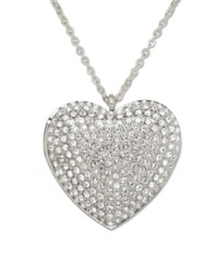 Radiate nostalgia and romance. Suspended elegantly from a long silver tone mixed metal chain, the front of this stunning heart is embellished in Swarovski crystal moonlight and clear Swarovski crystal pavé. Hide a secret message or a little picture inside this unique treasure! Approximate length: 27-1/2 inches. Approximate drop: 1-1/8 inches. Radiate nostalgia and romance. Suspended elegantly from a long silver tone mixed metal chain, the front of this stunning heart is embellished in Swarovski crystal moonlight and clear Swarovski crystal pavé. Hide a secret message or a little picture inside this unique treasure! Approximate length: 27-1/2 inches. Approximate drop: 1-1/8 inches.