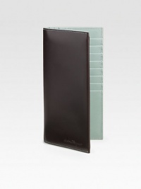 Sleek, trim, Italian calfskin case has sections for your passport, tickets, boarding pass, credit cards, cash and more.Eight card slotsThree currency slotsPassport folder3¾W X 7¼HMade in Italy Sleek, trim, Italian calfskin case has sections for your passport, tickets, boarding pass, credit cards, cash and more.Eight card slotsThree currency slotsPassport folder3¾W X 7¼HMade in Italy