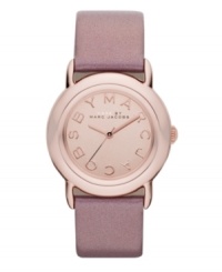 Tastefully trendy. The perfect amount of pink shimmer warms up this watch by Marc by Marc Jacobs. Metallic blush leather strap and round rose-gold ion-plated stainless steel case. Rose-gold tone mirrored dial features rose-gold tone logo letters at markers and three hands. Quartz movement. Water resistant to 50 meters. Two-year limited warranty. Tastefully trendy. The perfect amount of pink shimmer warms up this watch by Marc by Marc Jacobs. Metallic blush leather strap and round rose-gold ion-plated stainless steel case. Rose-gold tone mirrored dial features rose-gold tone logo letters at markers and three hands. Quartz movement. Water resistant to 50 meters. Two-year limited warranty.