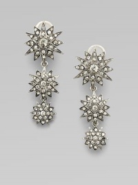 A cascade of shimmering stars, set with dazzling Swarovski crystals in a silvery setting.CrystalSilverplatedLength, about 2Clip-on backMade in Italy A cascade of shimmering stars, set with dazzling Swarovski crystals in a silvery setting.CrystalSilverplatedLength, about 2Clip-on backMade in Italy