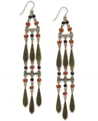 Drop in on modern fashion with these chandelier earrings from Lauren Ralph Lauren. Rows of beads create a dramatic look. Crafted in gold tone mixed metal. Approximate drop: 4-3/4 inches. Drop in on modern fashion with these chandelier earrings from Lauren Ralph Lauren. Rows of beads create a dramatic look. Crafted in gold tone mixed metal. Approximate drop: 4-3/4 inches.