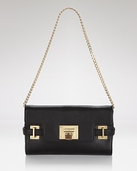 A versatile MICHAEL Michael Kors clutch with glamazon goldtone hardware and organized interior pockets. A versatile MICHAEL Michael Kors clutch with glamazon goldtone hardware and organized interior pockets.
