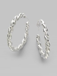 From the Glamazon Collection. A must-have hoop design in twisted sterling silver.Sterling silver Diameter, about 2 Post backs Imported From the Glamazon Collection. A must-have hoop design in twisted sterling silver.Sterling silver Diameter, about 2 Post backs Imported