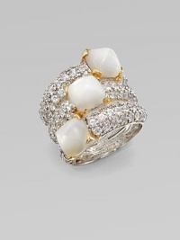 A statement piece with three mother-of-pearl sugarloafs set in white sapphire encrusted sterling silver with 18k gold accents. Mother-of-pearlWhite sapphireSterling silver18k goldWidth, about 1Imported