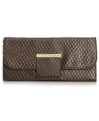 If you have an allure for the exotic, this posh Style&co. clutch is an excellent choice. The reversible design is dressed up in a circular-embossed pattern on one side and glam, metallic gold on the other. It easily takes your look away from the ordinary. If you have an allure for the exotic, this posh Style&co. clutch is an excellent choice. The reversible design is dressed up in a circular-embossed pattern on one side and glam, metallic gold on the other. It easily takes your look away from the ordinary.