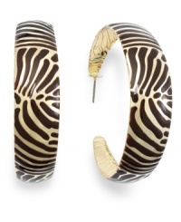 Wild things. These hoop earrings from Style&co. flaunt animal patterns in brown tone. Crafted in gold tone mixed metal. Approximate diameter: 2 inches. Approximate drop: 2-3/8 inches. Wild things. These hoop earrings from Style&co. flaunt animal patterns in brown tone. Crafted in gold tone mixed metal. Approximate diameter: 2 inches. Approximate drop: 2-3/8 inches.
