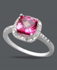Sparkle in her favorite color. Victoria Townsend's dynamic statement ring highlights a cushion-cut pink topaz (1-3/4 ct. t.w.) edged by sparkling, round-cut diamonds (1/10 ct. t.w.). Set in sterling silver. Size 7. Sparkle in her favorite color. Victoria Townsend's dynamic statement ring highlights a cushion-cut pink topaz (1-3/4 ct. t.w.) edged by sparkling, round-cut diamonds (1/10 ct. t.w.). Set in sterling silver. Size 7.