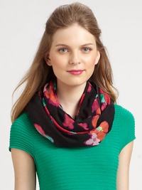 A feminine floral print adds whimsical charm to this scarf made from a luxurious combination of silk and cashmere.About 30 X 74Cashmere/silkDry cleanImported