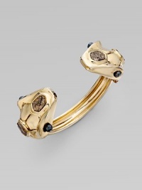 Make a statement with this striking piece with hematite gemstones and snake skin accents. 14K goldplated Slip-on style Diameter, about 2¼ Made in USA Make a statement with this striking piece with hematite gemstones and snake skin accents. 14K goldplated Slip-on style Diameter, about 2¼ Made in USA