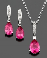 Make a charming entrance with this beautiful necklace and earrings set. Pear-cut pink topaz (6-1/3 ct. t.w.) are highlighted by round-cut diamond accents set in sterling silver. Pendant measures approximately 18 inches with a 1-inch drop. Earring drop measures approximately 3/4 inch. Make a charming entrance with this beautiful necklace and earrings set. Pear-cut pink topaz (6-1/3 ct. t.w.) are highlighted by round-cut diamond accents set in sterling silver. Pendant measures approximately 18 inches with a 1-inch drop. Earring drop measures approximately 3/4 inch.