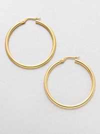 A simply classic, yet relevant design in radiant 18k gold. 18k goldLength, about 1.4Hinged post backMade in Italy A simply classic, yet relevant design in radiant 18k gold. 18k goldLength, about 1.4Hinged post backMade in Italy