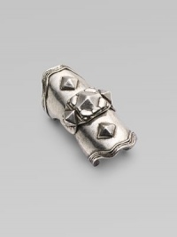 A piece of armor in silverplated metal with pyramid studding for a bold, edgy statement.Silverplated Center hinge Diameter, about 20mm, (.78) Length, about 2 Made in USA Additional Information Women's Ring Size Guide A piece of armor in silverplated metal with pyramid studding for a bold, edgy statement.Silverplated Center hinge Diameter, about 20mm, (.78) Length, about 2 Made in USA Additional Information Women's Ring Size Guide
