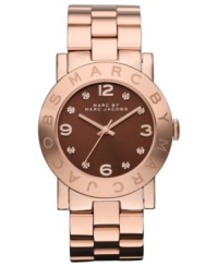 A captivating change of pace: a rosy-hued timepiece from Marc by Marc Jacobs. A captivating change of pace: a rosy-hued timepiece from Marc by Marc Jacobs.