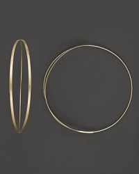 Get flirty with Lana's 14K yellow gold hoops. With an endless closure and sleek front split, these earrings add just the right amount of shine to your style. Designed by Lana. Get flirty with Lana's 14K yellow gold hoops. With an endless closure and sleek front split, these earrings add just the right amount of shine to your style. Designed by Lana.