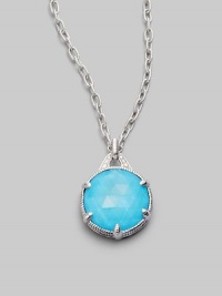 From the Eclipse Collection. A vividly colored, richly faceted turquoise sits in a sterling silver pronged setting with a graceful fluted texture and accents of sparkling white sapphire. Turquoise White sapphire Sterling silver Chain length, about 17 Pendant diameter, about ¾ Lobster clasp Imported