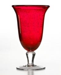 The eye-catching Iris iced tea glass makes a big impact in any setting with a bold ruby hue and tiny bubbles trapped in dishwasher-safe glass. From Artland. The eye-catching Iris iced tea glass makes a big impact in any setting with a bold ruby hue and tiny bubbles trapped in dishwasher-safe glass. From Artland.