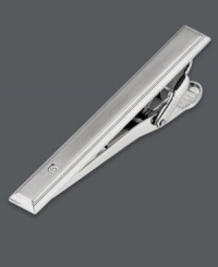 Organize your look. Keep your favorite tie in place while adding a little polish with this sleek tie bar. Crafted in stainless steel with a sparkling diamond accent. Tension backing helps keep ties secure. Approximate length: 2-1/8 inches. Approximate width: 1-4/10 inches. Organize your look. Keep your favorite tie in place while adding a little polish with this sleek tie bar. Crafted in stainless steel with a sparkling diamond accent. Tension backing helps keep ties secure. Approximate length: 2-1/8 inches. Approximate width: 1-4/10 inches.
