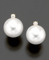 It's hard to improve upon perfection, but these earrings master the challenge with stunning cultured freshwater pearls (9-10 mm) and sparkling diamond accents. In 14k gold. It's hard to improve upon perfection, but these earrings master the challenge with stunning cultured freshwater pearls (9-10 mm) and sparkling diamond accents. In 14k gold.