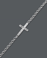 A modern update on the traditional cross. Studio Silver adds a simple twist by turning a symbolic cross charm on its side. Crafted in sterling silver with diamond-cut accents and rhodium plating to prevent tarnishing. Approximate length: 7-1/2 inches. A modern update on the traditional cross. Studio Silver adds a simple twist by turning a symbolic cross charm on its side. Crafted in sterling silver with diamond-cut accents and rhodium plating to prevent tarnishing. Approximate length: 7-1/2 inches.