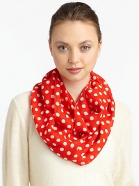 Lightweight wool is adorned with a 60's-inspired polka dot print for mod style.WoolAbout 17 X 77Dry cleanImported Lightweight wool is adorned with a 60's-inspired polka dot print for mod style.WoolAbout 17 X 77Dry cleanImported