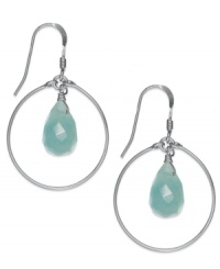 Crisp blue hues. These polished sterling silver hoops pop with the addition of blue jade drops (2-3/4 ct. t.w.). Earrings feature a fishhook backing. Approximate drop: 1 inch. Crisp blue hues. These polished sterling silver hoops pop with the addition of blue jade drops (2-3/4 ct. t.w.). Earrings feature a fishhook backing. Approximate drop: 1 inch.