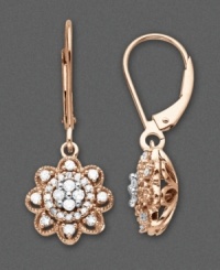 Dainty and elegant, twin flowers will dangle prettily from your lobes. Set in two tone 14k gold, these earrings feature round-cut diamonds (1/3 ct. t.w.) shaped in a floral pattern. Approximate drop: 1/2 inch.