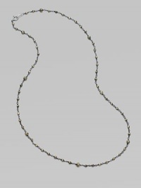A long, elegant chain of oxidized sterling silver is richly dotted with rough pyrite beads.Pyrite Oxidized sterling silver Length, about 18 Spring ring clasp Made in USA A long, elegant chain of oxidized sterling silver is richly dotted with rough pyrite beads.Pyrite Oxidized sterling silver Length, about 18 Spring ring clasp Made in USA
