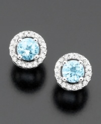 Elevate your style with twinkling round-cut aquamarine (3/8 ct. t.w.) stud earrings surrounded by round-cut diamonds (1/10 ct. t.w.). Set in 14k white gold. Elevate your style with twinkling round-cut aquamarine (3/8 ct. t.w.) stud earrings surrounded by round-cut diamonds (1/10 ct. t.w.). Set in 14k white gold.