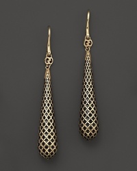 An intricate lattice design in 18K yellow gold is hand-detailed with enamel on Gucci's Diamantissima earrings. An intricate lattice design in 18K yellow gold is hand-detailed with enamel on Gucci's Diamantissima earrings.