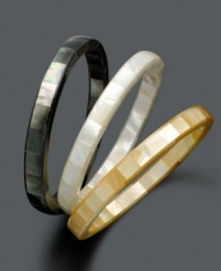 For the love of layering, you'll adore the way these multicolored Mother of Pearl bangles (10-11 mm) accentuate your look. This three bracelet set comes in black, white and bronze hues with an easy slip-on style for ultimate versatility. Approximate diameter: 2-1/2 to 2-3/4 inches.