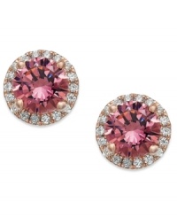 Perfection in pink. These pretty circular studs features pink (2-3/4 ct. t.w.) and white (1 ct. t.w.) Swarovski zirconias set in 14k rose gold over sterling silver. Approximate diameter: 3/8 inch.