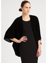 An ultra-plush, velvet-y soft shrug with chic stripes.70% viscose/23% silk/7% polyesterAbout 80 X 115Dry cleanImported