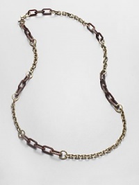 A chic piece with pavé stones on glossy plastic and shiny metal links. Glass stonesBrassEpoxyLength, about 16.4Spring ring closureImported A chic piece with pavé stones on glossy plastic and shiny metal links. Glass stonesBrassEpoxyLength, about 16.4Spring ring closureImported
