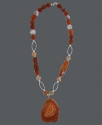 Breathe energy into your look with a little citrus flavor. Avalonia Road's Brasilian-inspired necklace features round, oval and sliced fire agate (120 ct. t.w.) set in sterling silver. Approximate length: 24 inches. Approximate drop: 1/2 inch. Breathe energy into your look with a little citrus flavor. Avalonia Road's Brasilian-inspired necklace features round, oval and sliced fire agate (120 ct. t.w.) set in sterling silver. Approximate length: 24 inches. Approximate drop: 1/2 inch.