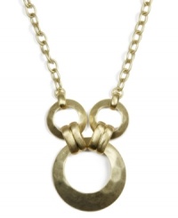 Industrial chic meets rustic charm in this unique triple ring pendant from Jones New York. Hammered texture necklace crafted from gold-plated mixed metal. Approximate length: 18 inches. Approximate drop: 2 inches. Industrial chic meets rustic charm in this unique triple ring pendant from Jones New York. Hammered texture necklace crafted from gold-plated mixed metal. Approximate length: 18 inches. Approximate drop: 2 inches.