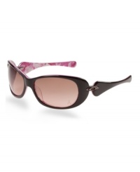 Organically Rounded, voluptuous contours and a smooth, sleek finish heighten the feminine allure of this design. This sporty yet conservative style fuses classic and retro design enhanced by authentic Oakley metal icons on an acetate frame. The inside of the eye wear stems features the breast cancer awareness pink ribbon design to make this style completely unique. It struts on the beach and the streets, begging onlookers to take notice. Organically Rounded, voluptuous contours and a smooth, sleek finish heighten the feminine allure of this design. This sporty yet conservative style fuses classic and retro design enhanced by authentic Oakley metal icons on an acetate frame. The inside of the eye wear stems features the breast cancer awareness pink ribbon design to make this style completely unique. It struts on the beach and the streets, begging onlookers to take notice.