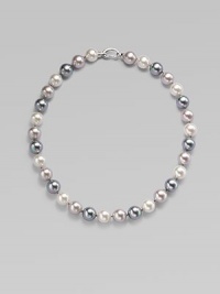 Three gentle tones - grey, nuage and white - come together in a graceful strand of round organic pearls with a sterling silver clasp. 12mm round man-made multicolor pearls Length, about 17 Sterling silver spring clip clasp Made in Spain Three gentle tones - grey, nuage and white - come together in a graceful strand of round organic pearls with a sterling silver clasp. 12mm round man-made multicolor pearls Length, about 17 Sterling silver spring clip clasp Made in Spain