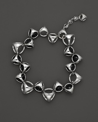 A bold sterling silver bracelet, gleaming with black onyx, is an elegant showcase for Di MODOLO's iconic Triadra design. A bold sterling silver bracelet, gleaming with black onyx, is an elegant showcase for Di MODOLO's iconic Triadra design.