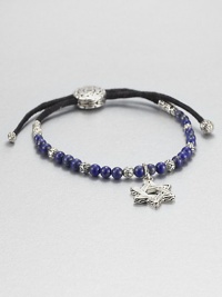 From the Batu Bedeg Collection. A beaded strand of carved silver and richly colored lapis is strung on a black fabric cord and highlighted by a stunning Star of David silver charm.LapisSterling silverAdjusts from about 6 to 9 longSliding bead closureMade in Bali From the Batu Bedeg Collection. A beaded strand of carved silver and richly colored lapis is strung on a black fabric cord and highlighted by a stunning Star of David silver charm.LapisSterling silverAdjusts from about 6 to 9 longSliding bead closureMade in Bali