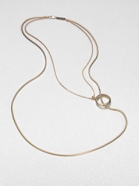A radiant design with an unique mix of link chain and snake chain accented with a large loop embellishment. BrassLength, about 25Lobster clasp closureMade in Italy A radiant design with an unique mix of link chain and snake chain accented with a large loop embellishment. BrassLength, about 25Lobster clasp closureMade in Italy
