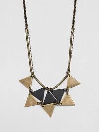 From the Facet Collection. An intriguing sunburst design is formed from antiqued and powder-coated brass triangles, hanging from snake and open link chains.BrassLength, about 28Lobster claspMade in USA From the Facet Collection. An intriguing sunburst design is formed from antiqued and powder-coated brass triangles, hanging from snake and open link chains.BrassLength, about 28Lobster claspMade in USA