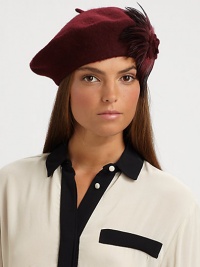 This wool-blend knit beret with large feather design is reminiscent of old Hollywood style.Pull-on style with concealed elastic bandWoolDo not washImported This wool-blend knit beret with large feather design is reminiscent of old Hollywood style.Pull-on style with concealed elastic bandWoolDo not washImported