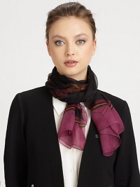 A semi-sheer silk chiffon scarf is decorated with a beautiful floral print and solid border.Chiffon silkAbout 27.6 X 70.9Dry cleanMade in Italy A semi-sheer silk chiffon scarf is decorated with a beautiful floral print and solid border.Chiffon silkAbout 27.6 X 70.9Dry cleanMade in Italy